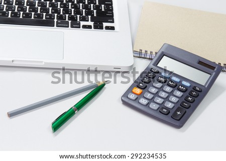 Accountant desktop with a calculator