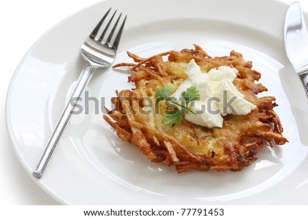 potato pancake with sour cream
