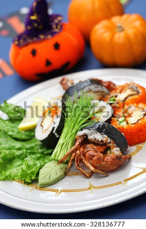 spider roll, maki sushi made of soft shell crab tempura and sushi rice, halloween party dinner