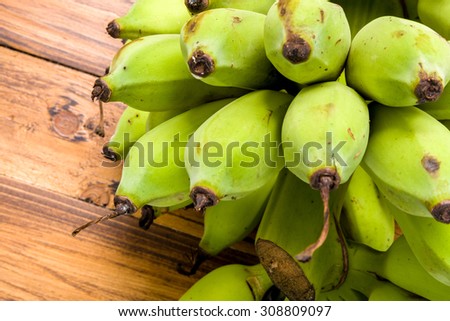 Banana / Green Banana / Banana on Wooden Background