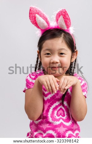 Little Girl with Bunny Ears on White / Little Girl with Bunny Ears / Little Girl with Bunny Ears, Studio Shot