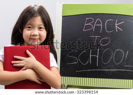Back to School Education Concept on White / Back to School Education Concept / Back to School Education Concept Illustrated by Kid Holding Book