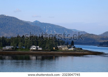 Image, Stock Photo Small coastal village with cottages in bay near snowy mountains