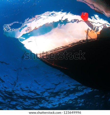 Underwater design pattern. Dive boat floating on water surface