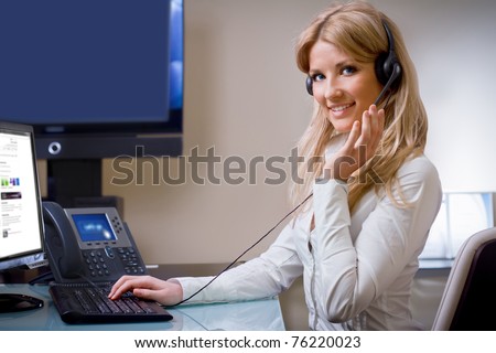 online suport call center attractive blue eyed blonde talking hands free device