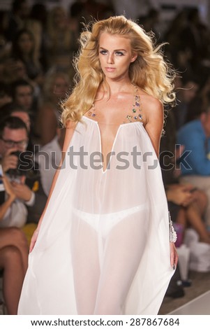 MIAMI - JULY 18: Model Effy Harvard walks the runway for Beach Bunny Swim collection during Mercedes Benz Fashion Week Swim at The Raleigh Hotel on July 18, 2014 in Miami Beach Florida