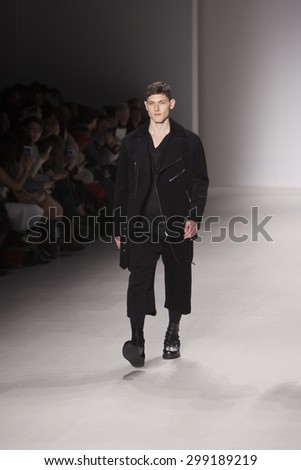 Male model walks the runway for Korean Designer Noirer Asian Fashion Collection Fashion Show at Mercedes Benz Fashion Week Fall Winter 2015 at the Lincoln Center i New York City, February 14, 2015