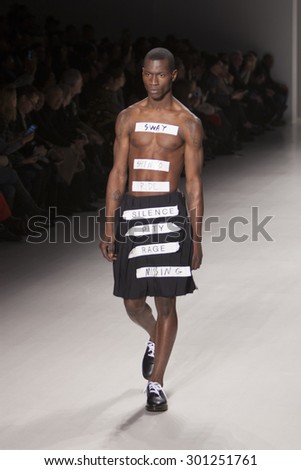 Male model walks the runway for Japanese Designer Tsubasa Shinyo during the Asian Fashion Collection at Mercedes Benz Fashion Week Fall Winter 2015 in New York City, February 14, 2015