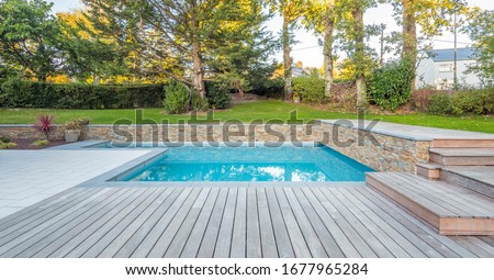 home swimming pool in garden and terrace