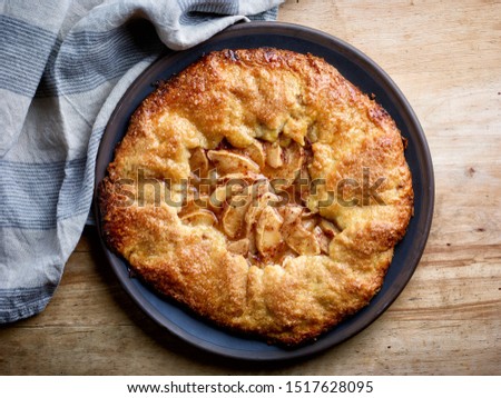 Similar – Image, Stock Photo Traditional french apple tart over brown planks