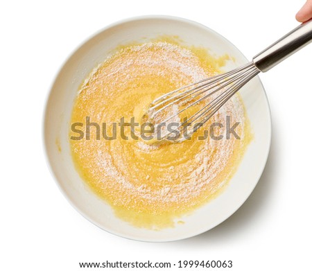 Similar – Image, Stock Photo Eggs in a bowl and baking ingredients on a kitchen table. Rustic.