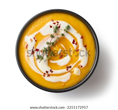 Similar – Image, Stock Photo Orange vegetable cream with slices of carrots and herbs