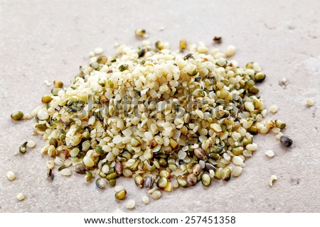 heap of hemp seeds on kitchen table