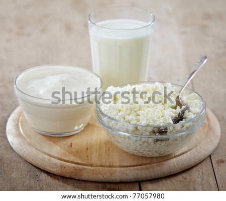 fresh milk products on old wooden table