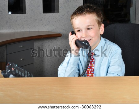 Young men answering the telephone at the reception