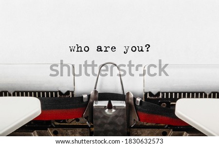 Similar – Image, Stock Photo Who are you? | Teacher points with her hand to the question on the board