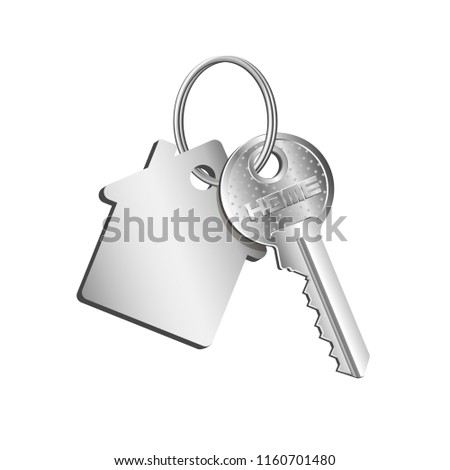 Key house on the ring with a key fob, concept of sale purchase of real estate, rental of property