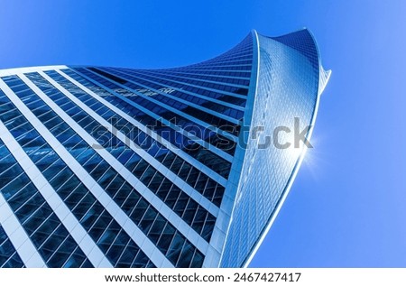 Similar – Image, Stock Photo modern building and a lantern with a grey cloudy sky