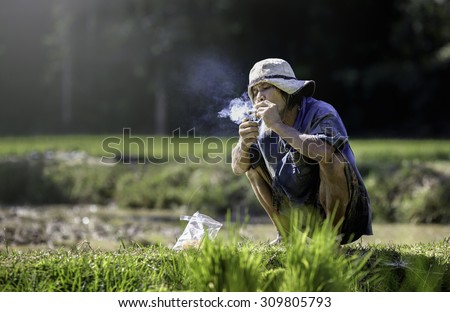 The old man smoking
