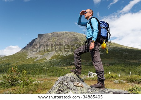 A man taking a break during hiking in Hemsedal, Norway