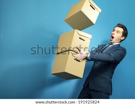 Corporate man with a cardboard box