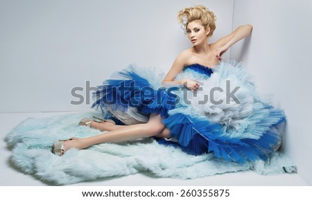 Elegant lady lying on the floor