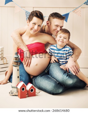 Happy family expecting a baby