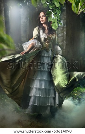 Young lady in a mysterious forest