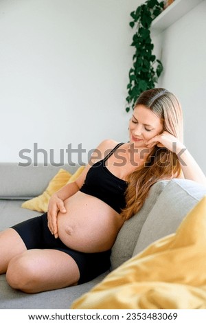 Similar – Image, Stock Photo Anonymous delicate mother sitting on floor with newborn at home