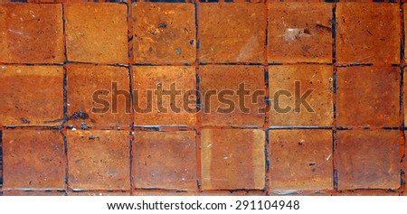 terracotta square tile grid pattern