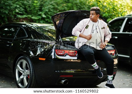 Similar – Image, Stock Photo Serious young stylish guy standing near shabby wall on street