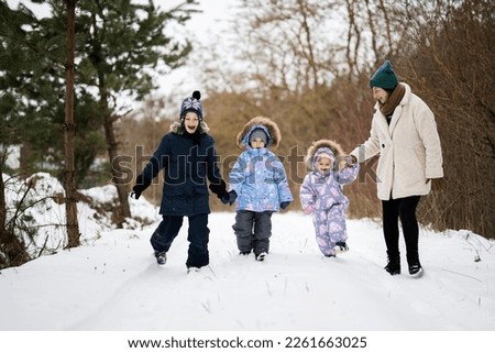 Similar – Image, Stock Photo Woman and kid holding hands on a meadow