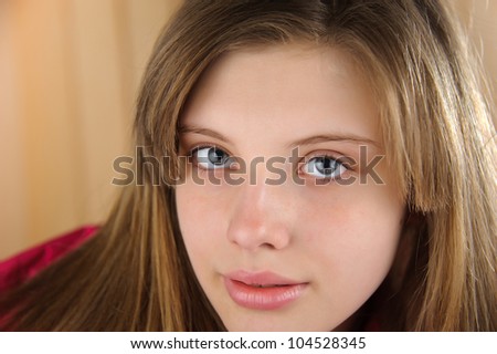 Close-up portrait of a attractive girl. Youth, beauty and health.
