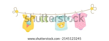 Baby clothes drying on a rope. Vector illustration
