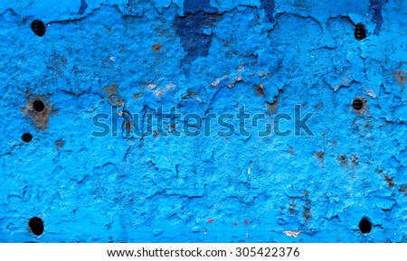 Old and rust blue paint on metal background