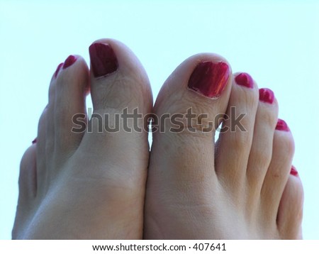Toes with red nail polish