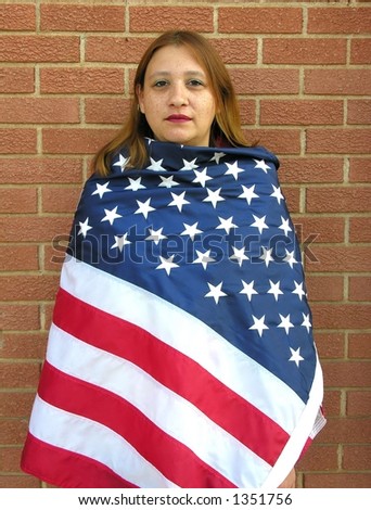 American Indian Woman wrapped in American Flag