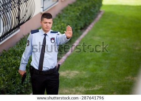 Security guard working outdoor.