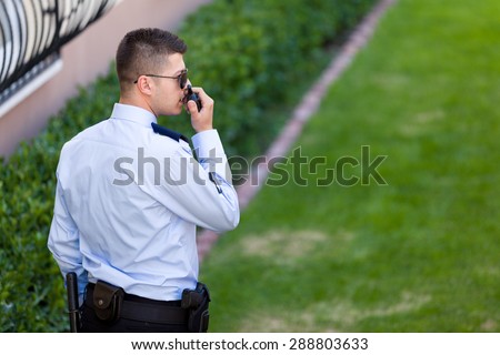 Security guard working outdoor.