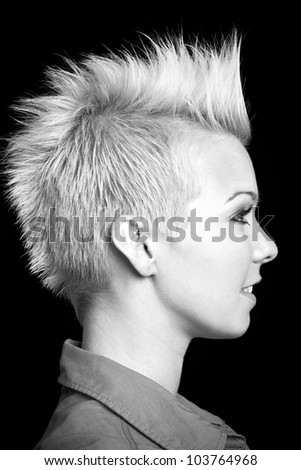 beautiful woman profile portrait against black background - black and white