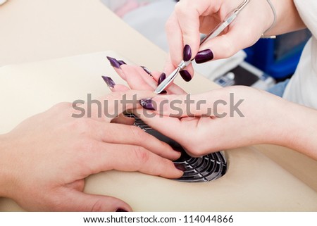 manicure, care of fingers of hands, cleaning, covering a varnish of nails