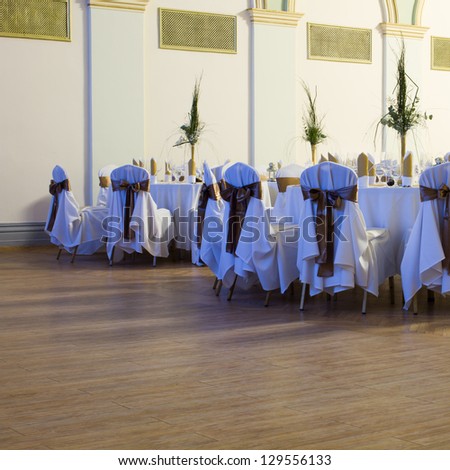 hall interior with wooden dance floor, wedding or another catered event place