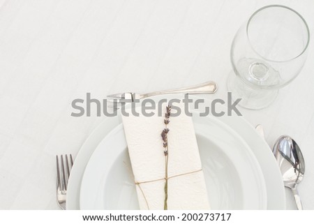 dining table setting with lavender - top view