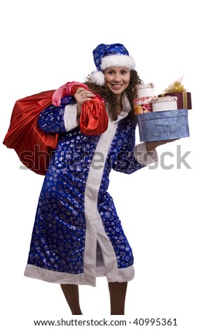 Santa woman dressing up in blue Christmas costume is holding red sack with gifts. Beautiful Snow Maiden holding a Christmas bag full of presents.