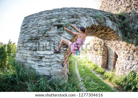 Similar – Image, Stock Photo Girls climb a fence in the spring in the garden.The concept of childhood, cheerfulness, carefree.