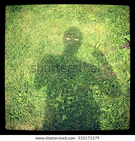 Shadowy selfie in grass with maple seed eyes Instagram