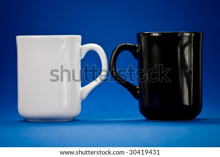 two mugs on the blue background