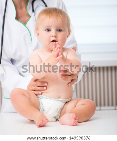 baby at the doctor pediatrician on office