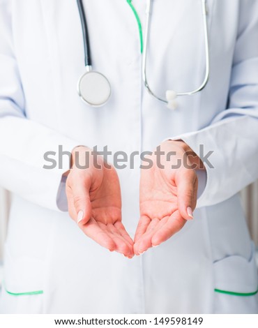 doctor holding her hands palms up