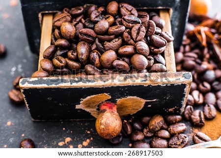 Old wooden box with coffee beans inside